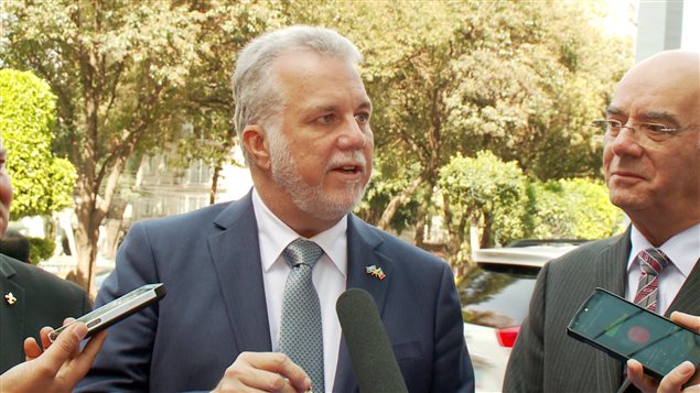 رئيس حكومة كيبك فيليب كويار ووزير الاقتصاد والابتكار والتصدير جاك داوو 
