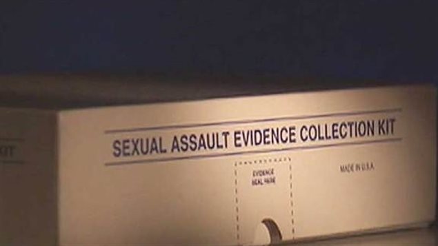 A shortage of nurses to examine rape victims has women's rights advocates concerened. We see a rectangle cardboard box about six inches high. The words, "Sexual Assault Evidence Collection Kit" is written in blue across the upper part of the side we see.
