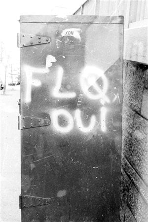 A postal box in Montreal bearing the graffiti FLQ oui (FLQ yes) in July 1971. The FLQ conducted several bombings of post boxes which typically bore a decal of the Royal Coat of Arms of Canada. It is not clear whether this was a leftover from earlier in the crisis, or the work of a lingering sympathizer after the end of the crisis.