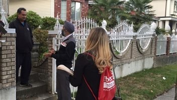 Campaigning Liberal candidate Harfit Sajjan (centre) says the content of the Conservative attack ads ‘is absolutely not true.’