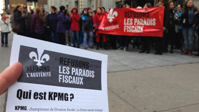 Cientos de manifestantes denuncian en Montreal las medidas de evasión fiscal de las que se benefician algunos clientes de KPMG.
