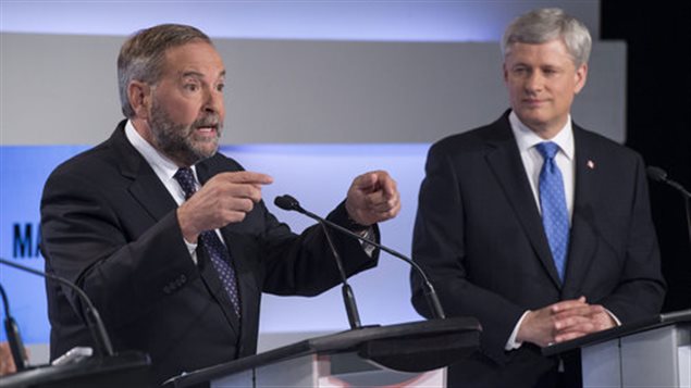 Aug 6, 2015, Toronto: NDP leader Thomas Mulcair making a point during the first leaders debate as current Prime Minister and Conservative Party leader Stephen Harper looks on,