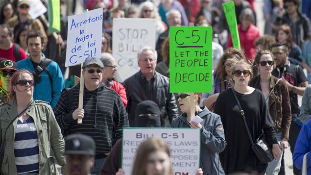 People protested the proposed security legislation, Bill C-51, in front of Parliament on April 18, 2015.