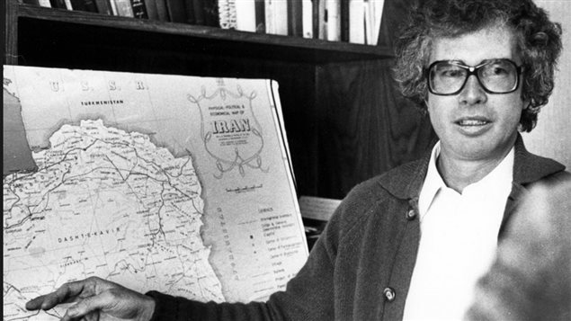 Ken Taylor briefs a Canadian Press reporter on the current conditions in Iran one week before leaving Iran in 1980. Taylor kept six Americans hidden at the Canadian embassy in Tehran and facilitated their escape by getting fake passports and plane tickets for them. 
