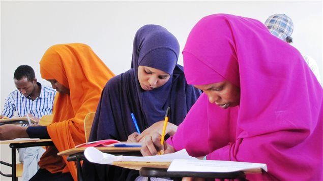 Students work on their York University courses in the Borderless Higher Education for Refugees learning centre in Dadaab camp in Kenya.