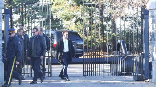 POlice and crash barriers at the gates to thr property. Security was beefed up following an intruder in 1995 who wandered around the property and house for an hour in a possible assassination attempt before police took him in.