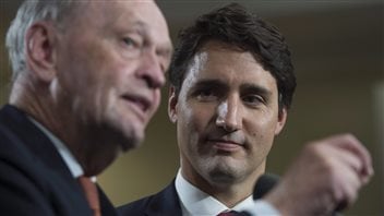 Liberal Leader Justin Trudeau and former prime minister Jean Chretien speak to the media in Hamilton, Ont., on September 13, 2015. 