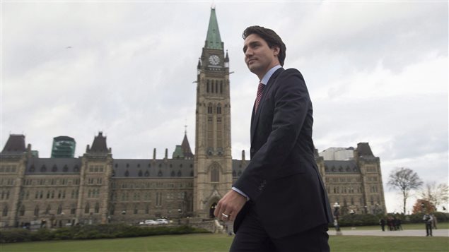  Prime minister-designate Justin Trudeau makes his way from Parliament Hill to the National Press Theatre to hold a press conference in Ottawa on Tuesday, October 20, 2015.