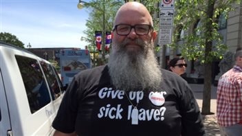 This public servant was part of a multi-union protest in June 2015 against Conservative cuts to the federal civil service and threatened reductions in the benefits to employees.