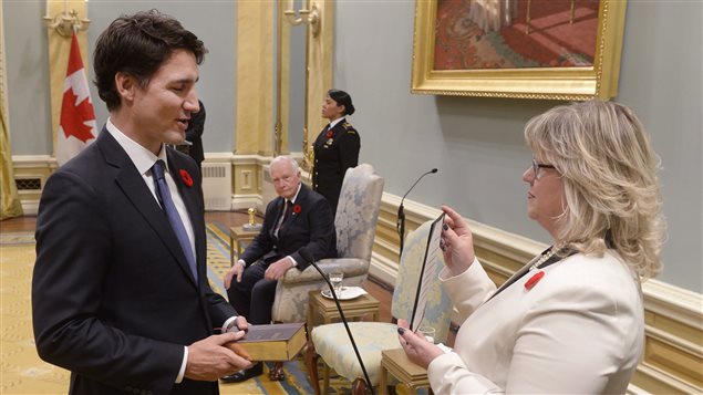  Justin Trudeau takes the oath of office as he is sworn in as prime minister of Canada at Rideau Hall in Ottawa on Wednesday, November 4, 2015. 