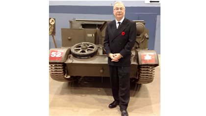 Brent Wilson, military history professor, University of New Brunswick. pictured here in front of a 1942Canadian designed and built Universal Carrier, also known as a Bren Gun carrier at an event he helped organize for Remembrance Day 2015
