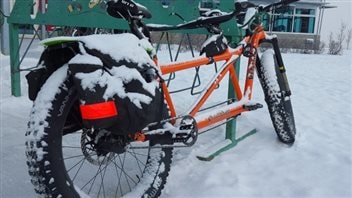 Some cyclists but bigger and sometimes studded tires on their bikes for better traction in winter.