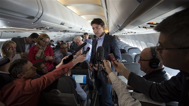  Prime Minister Justin Trudeau speaks to reporters while flying from Antalya, Turkey to Manila, Philippines on Tuesday, Nov. 17, 2015, to attend the APEC Summit.