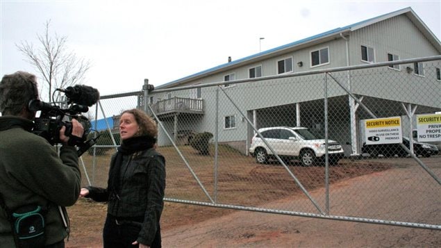 Lucy Sharratt, Coordinator, Canadian Biotechnology Action Network being interviewed in ront of the Aqua Bounty research and development facility in Prince Edward Island in 2013