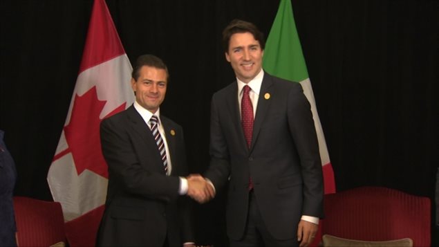 El presidente de México Enrique Peña Nieto y primer ministro canadiense Justin Trudeau reunidos en Turquía durante cumbre del G20. 