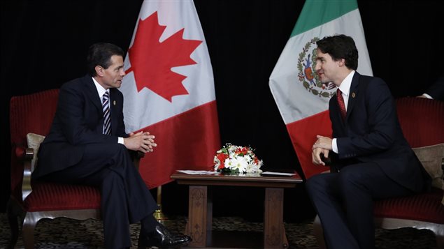 El presidente de México Enrique Peña Nieto y el primer ministro canadiense Justin Trudeau en reunión bilateral en el marco de la reunión del G20 en Turquía. 