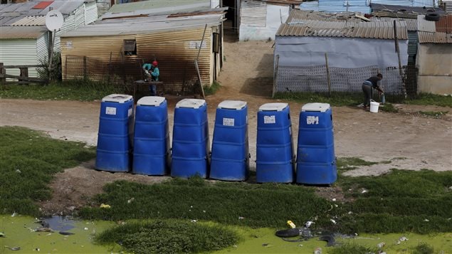  Temporary toilets stand in front of shacks in Khayelitsha township, Cape Town, South Africa, October 14, 2015. Some 2.4 billion people around the world don't have access to decent sanitation and more than a billion are forced to defecate in the open, risking disease and other dangers, according to the United Nations.