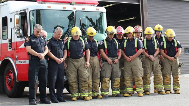  Members of Chatham-Kent fire service pay their respects to fallen Canadian volunteer John Gallagher.