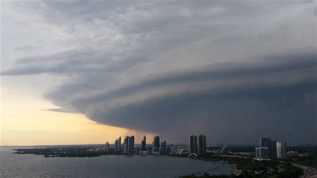  A major storm cloud moves over Etobicoke as it passed through southern Ontario on August 2, 2015. A top Canadian meteorologist warns that municipalities aren't prepared to deal with the impacts of an increasingly volatile climate that can bring devastating floods one season and a drought the next. 