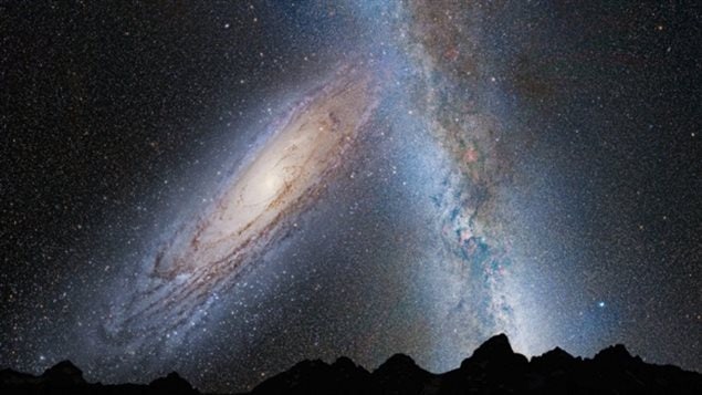 An illustration showing the predicted merger of our Milky Way galaxy with the neighboring Andromeda galaxy. In this image, representing Earth's night sky in 3.75 billion years, Andromeda, left, fills the field of view and begins to distort the Milky Way with tidal pull. 