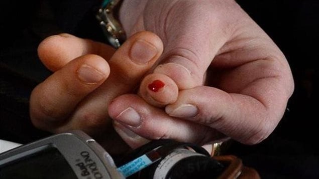 Diabetes patient testing blood sugar levels. The Canadian Diabestes Assocation is calling for urgent action from government to deal with ever increasing numbers of diabetes patients.