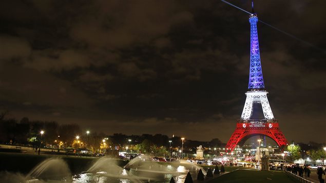The Eiffel Tower was lit up in the colours of the French flag after the terrorist attacks of November 13, 2015. Canada does not advise against going to France, but suggests travellers exercise “a high degree of caution.”