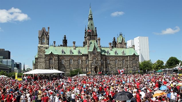 Crowds of Canadians gather on Parliament Hill in Ottawa for Canada Day celebrations July 1. The population as of July 1 2015 was estimated at voer 35,851,800