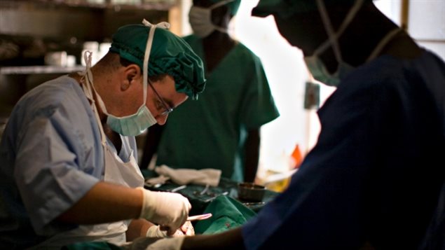 A surgeon with Doctors Without Borders operates on a patient in the town of Nasir in southeastern Sudan in June 2009. In August 2015, the humanitarian group said two of aid workers had been killed in South Sudan's troubled Unity region. (