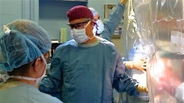 Dr Harvey in operating theatre. The new research can simplify surgical procedures worldwide and reduce costs while also showing less infection and better healing results