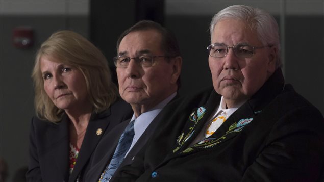  Commissioner Justice Murray Sinclair, Commissioner Chief Wilton Littlechild and Commissioner Marie Wilson (right to left) listen to a speaker as the final report of the Truth and Reconciliation commission is released, Tuesday December 15, 2015 in Ottawa.