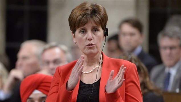  International Development Minister Marie-Claude Bibeau responds to a question during Question Period in the House of Commons Wednesday December 9, 2015 in Ottawa.