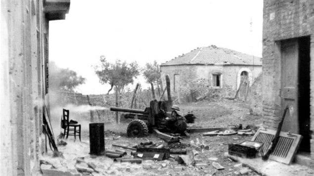 Canadian 6-pounder anti-tank gun engages in direct fire in Ortona 21 December 1943