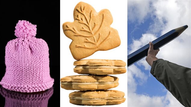 Une tuque, des biscuits feuille d'érable et un crayon Une tuque, des biscuits feuille d'érable et un crayon