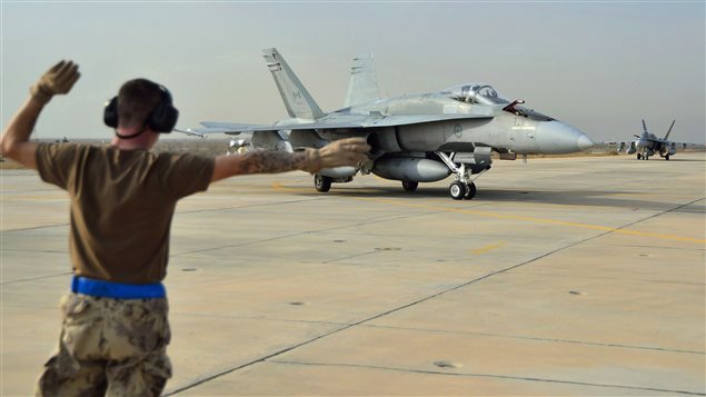  A Canadian Armed Forces CF-18 Fighter jet from 409 Squadron taxis after landing, in Kuwait, on October 28, 2014. Two CF-18s struck a fighting position belonging to the Islamic State in Iraq and the Levant, northwest of occupied Mosul, the embattled country’s second-largest city on Thursday, Dec. 17, 2015.