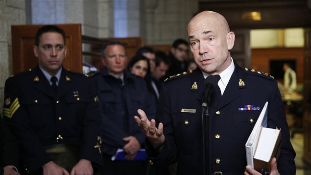  Royal Canadian Mounted Police Commissioner Bob Paulson speaks to media after a public safety committee meeting on Parliament Hill in Ottawa March 6, 2015.