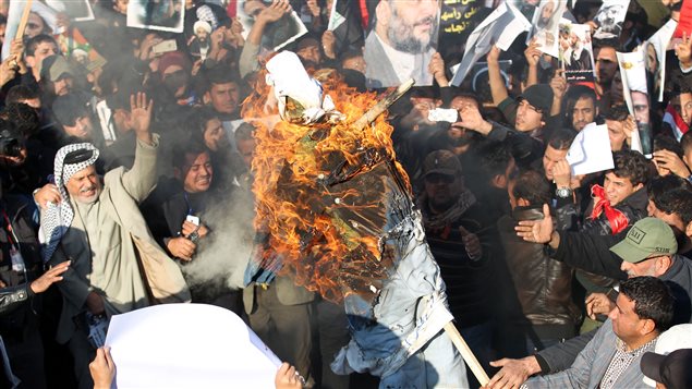 مؤيّدو الزعيم الشيعي مقتدى الصدر يتظاهرون في بغداد احتجاجا على إعدام رجل الدين الشيعي البارز في السعوديّة نمر النمر