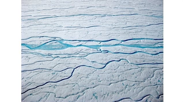 Meltwater rivers on the Greenland ice sheet. New research show climate change is altering the composition of the firn and can reduce is absorption ability of surface melt, meaning potentially greater mass loss of the ice sheet.