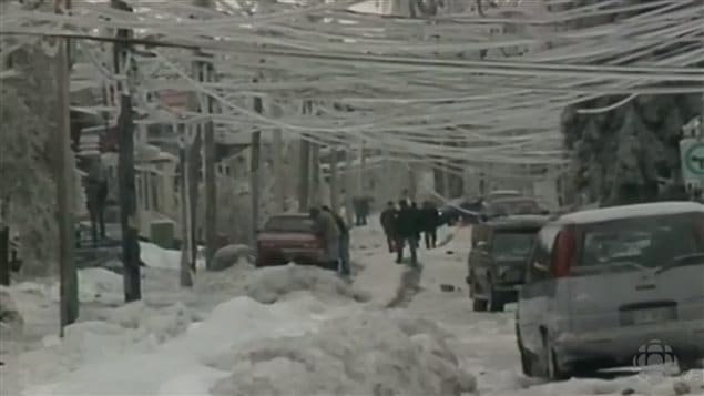 Streets covered with ice-covered snow banks frozen solid, with heavily laden power lines drooping an breaking, along with thousands of broekn branches littering the streets ms