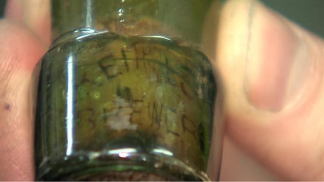 The name of the brewery is still visible on the remaining cork. At first it was presumed, but not certain that the liquid was beer.
