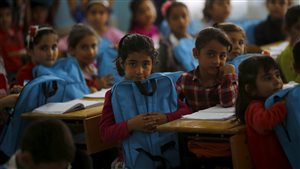  Syrian refugee children are seen during a lesson at Fatih Sultan Mehmet School in Karapurcek district of Ankara, Turkey, October 2, 2015. Out of 640,000 Syrian children in Turkey, 400,000 are not at school.