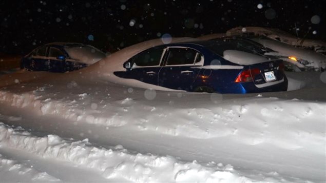 About 60 cm of snow buried the cars of guests attending a wedding reception in the eastern county of Antigonish on January 16, 2016.