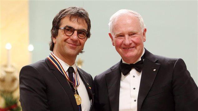  Atom Egoyan, film and stage director visual artist and screenwriter, receives the 2015 Lifetime Artistic Achievement Award at the Governor General’s Performing Arts Awards from Governor General David Johnston (right), Friday May 29, 2015 in Ottawa.