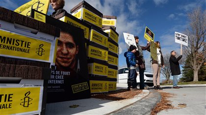 Protesters rallied outside Saudi Arabia’s embassy in Ottawa on November 2, 2015, to demand the release of Saudi blogger Raif Badawi.