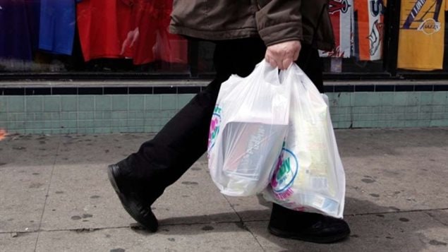 Experience suggests making people pay for plastic bags can reduce their use by half.