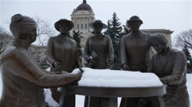 A statue of the ‘Famous Five’ who fought for women’s right to vote stands by the legislature of the province of Manitoba.