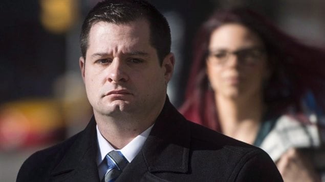 Const. James Forcillo, charged in the shooting death of Sammy Yatim, walks into court in Toronto, Wednesday, Nov, 25, 2015. On Monday, a jury found Forcillo guilty of attempted murder but not guilty of second-degree murder