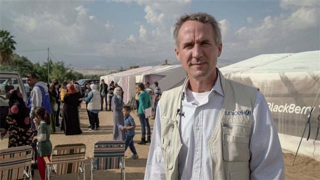 Robert Jenkins during a field visit to a UNICEF mobile nutrition outreach at an informal settlement of Syrian refugee families in Southern Jordan – 2015