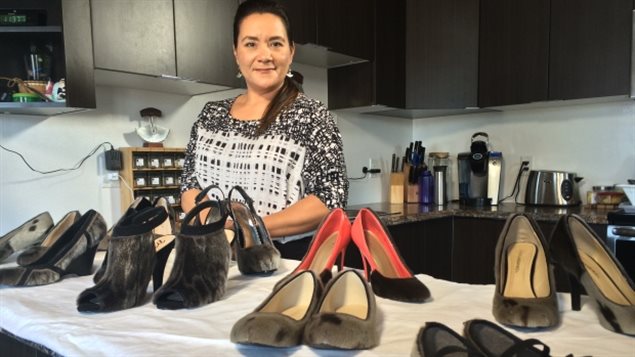 July 2015-Nunavut Designer Nicole Camphaug showcases samples of her modern sealskin-covered footware in her Iqaluit home. It all started with her own pair of neglected boots. ’I was going to sell them, but then I thought, ’Hmm... I’m going to try something.’ 