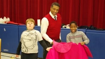 Mark S. Doss was honoured as a positive role model for children like these at the Buchanan Park Opera Club in Hamilton, Ontario.