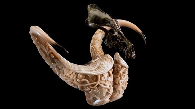 Shane Wilson -*self portrait* Musk oxen horns, bronze wolf skull, 14x23x11in, 2008-2009